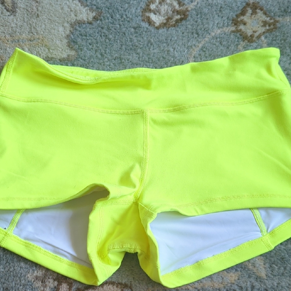 Yellow Athletic Shorts with Snug Fit and Stretchy Material